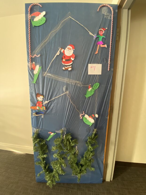 Christmas door decorating entry number 4: Santa and the elves fishing for fun treats
