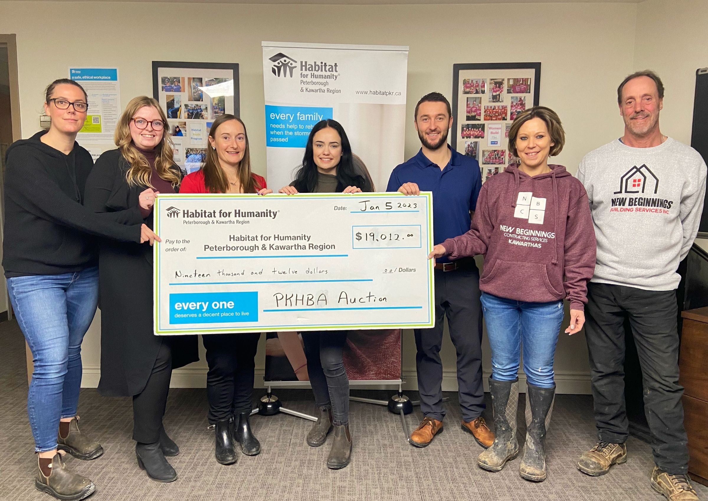 Habitat for Humanity Peterborough & Kawartha Region with representatives from PKHBA and New Beginnings Contracting Services raises over $19,000 from the charity auction