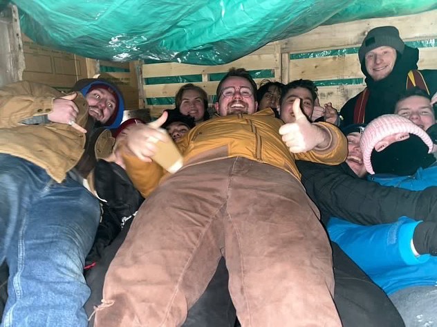 TKE student fraternity members camp out in a make-shift box shelter for 48 hours