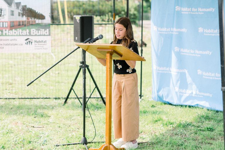 2023 Meaning of Home winner Ellyot Wood reads her winning piece "What Home Means To Me" at the Build Kick-Off for Phase 2