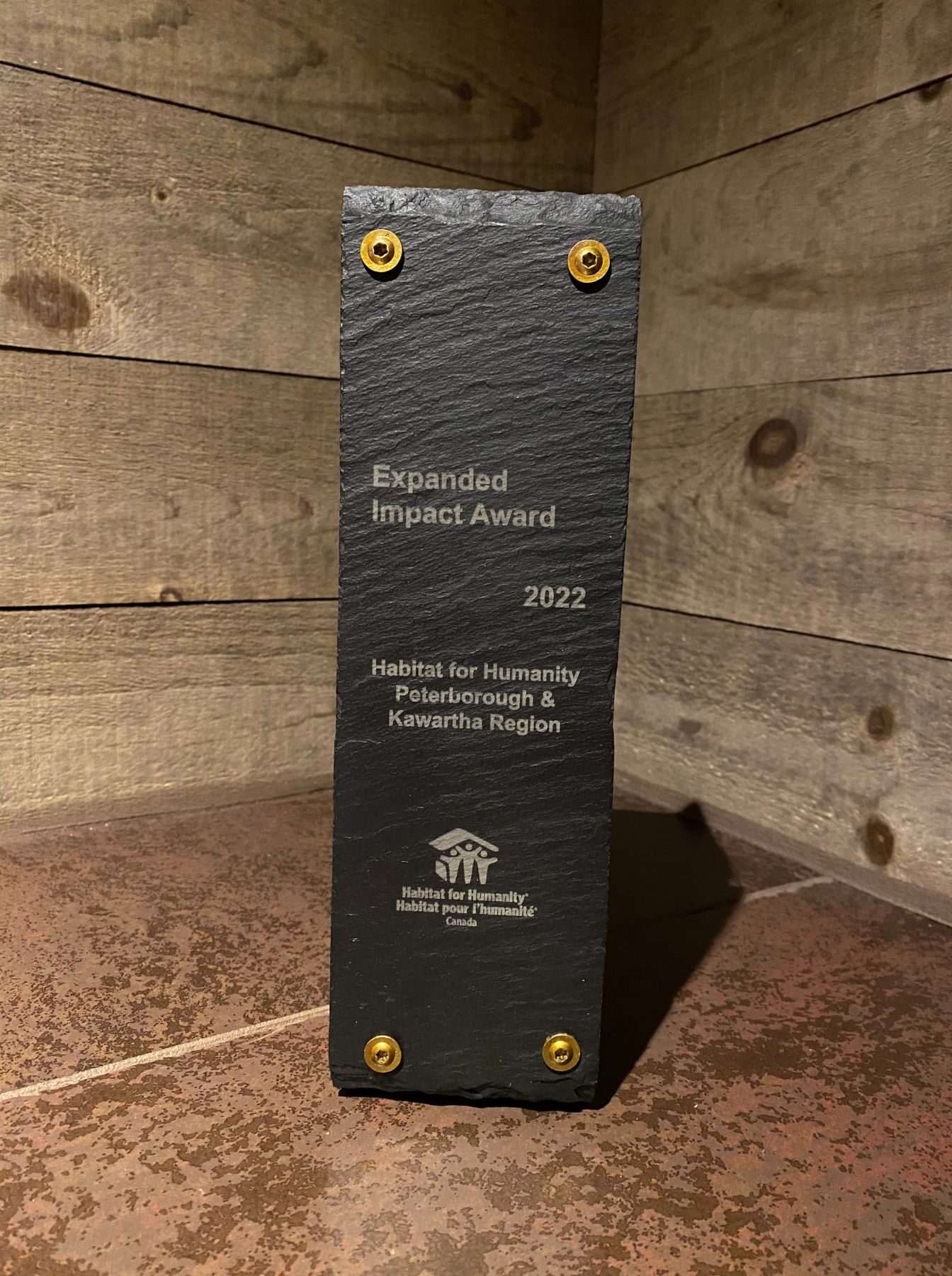 Expanded Impact Award trophy received by Habitat PKR at the Habitat Canada National Conference in Winnipeg Manitoba on May 10-12, 2023