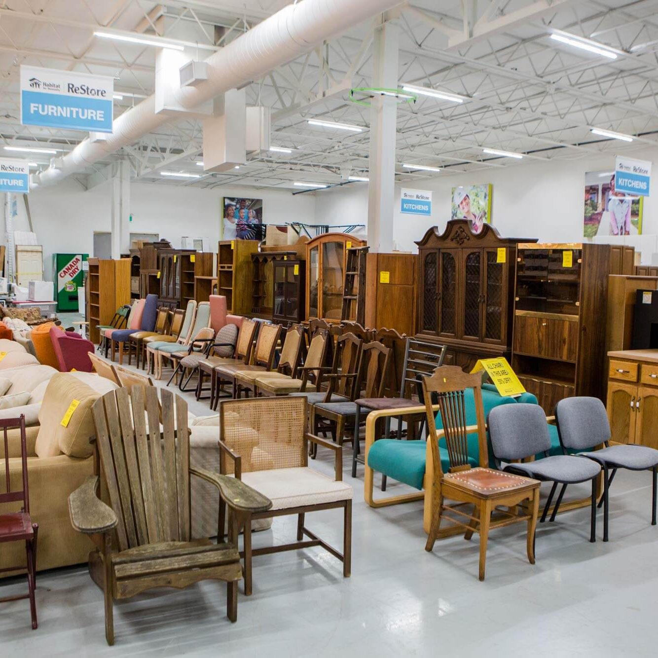 The ReStore showroom floor, full of a variety of well organized chairs, dressers and sofas